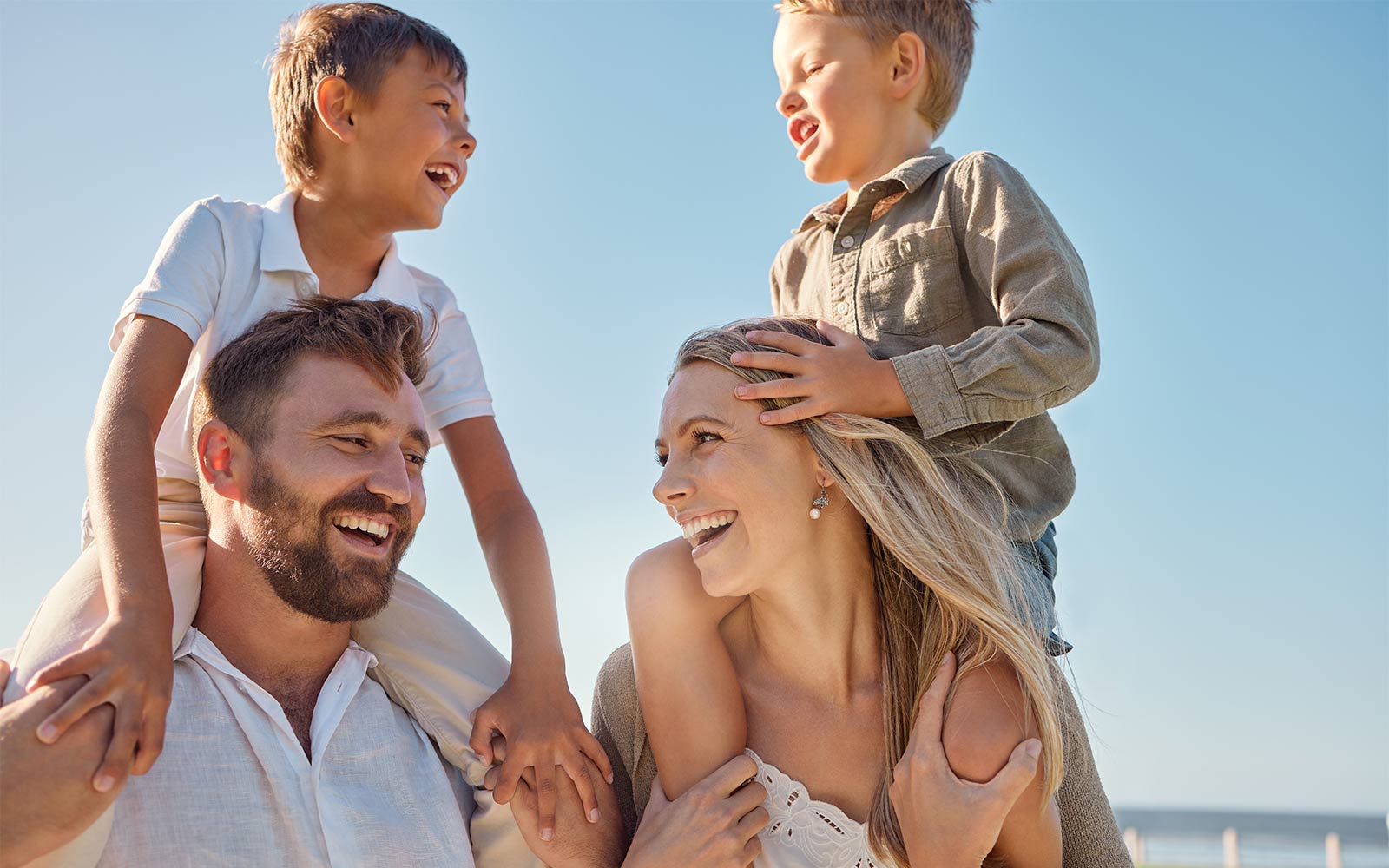 couple with children on their backs